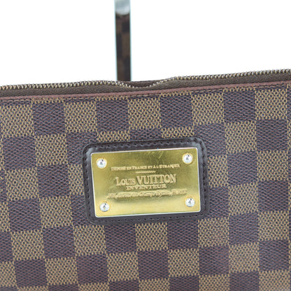 Louis-Vuitton Eva Bag in Damier Ebene with strap