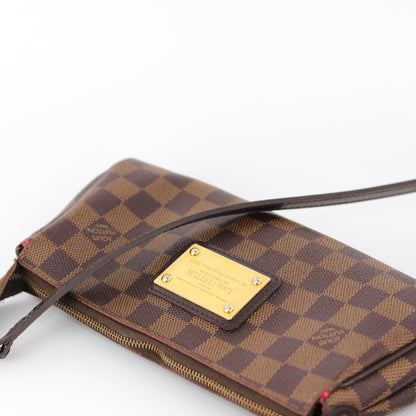 Louis-Vuitton Eva Bag in Damier Ebene with strap