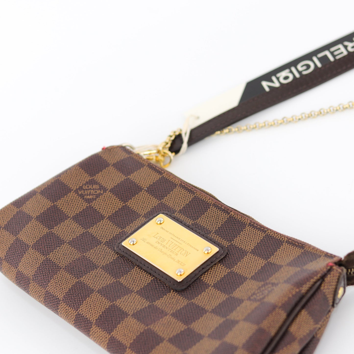 Louis-Vuitton Eva Bag in Damier Ebene with strap