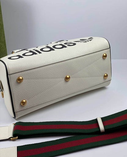 Gucci x adidas mini duffle bag white