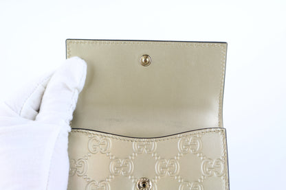 Gold Guccissima Bow Wallet