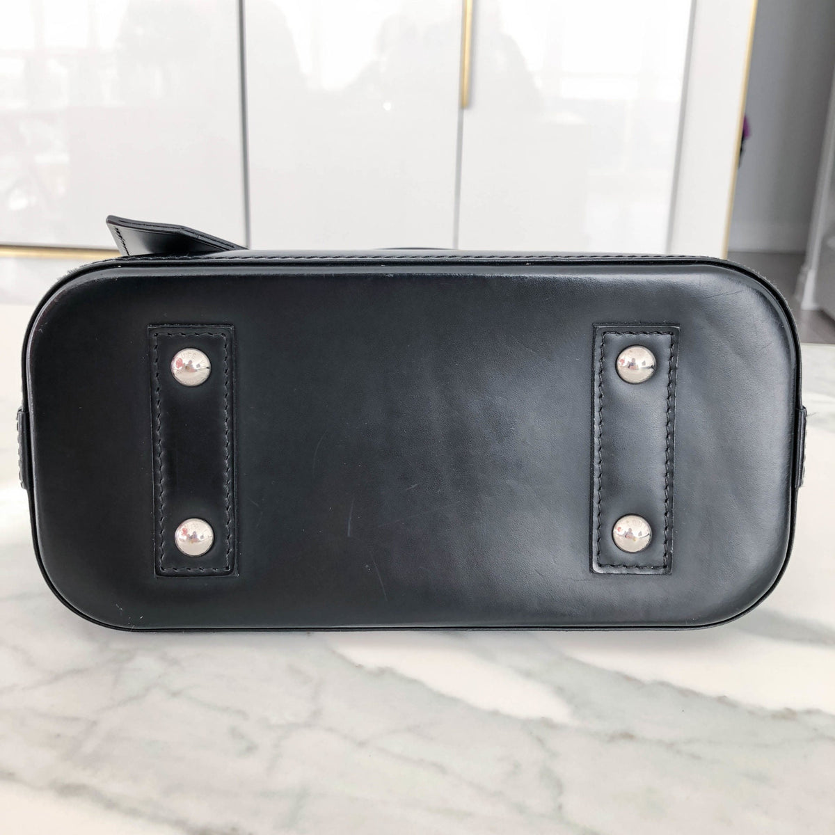 Louis-Vuitton Alma BB in Black Epi Leather