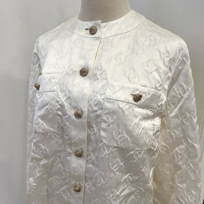 Chanel 25A Runway Embossed CC Logo Long Sleeved Blouse in Ecru Cotton and Silk (Model: P79802)