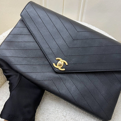 Chanel Clutch in Chevron Quilted Black Calf Leather and AGHW