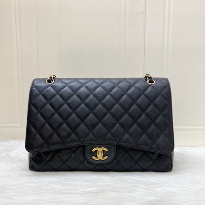 Chanel Maxi Classic Single Flap Bag in Black Caviar and GHW