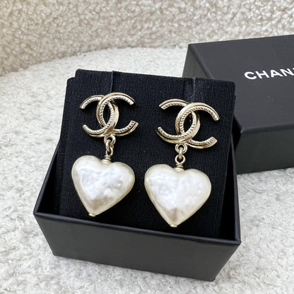 Chanel 22C CC Logo with Heart Pearl Dangling Earrings in LGHW (Model: AB7529)