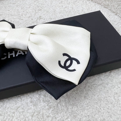 Chanel 23B Bow Barrette Hair Clip in Black and Off White Fabric