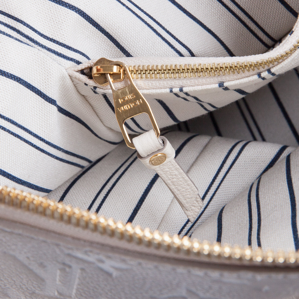 Louis-Vuitton Neige Monogram Empreinte Lumineuse PM Bag