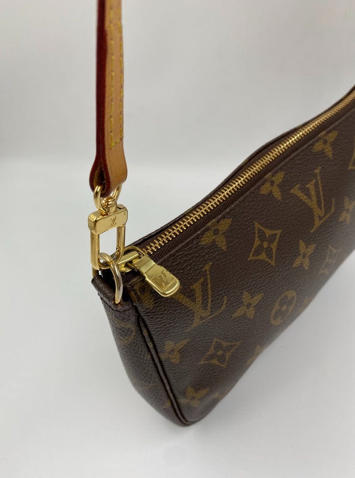 Louis Vuitton Pochette with shoulder strap and crossbody.