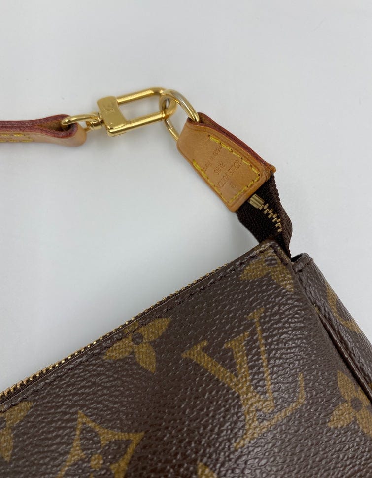 Louis Vuitton Pochette with shoulder strap and crossbody.