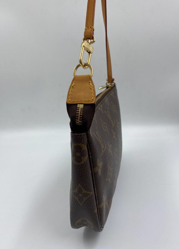 Louis Vuitton Pochette with shoulder strap and crossbody.