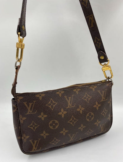 Louis Vuitton Pochette with crossbody strap.