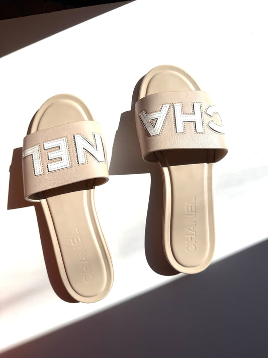 CHANEL Print Logo Neutral White Slip on Leather Slide Sandals 38 7.5
