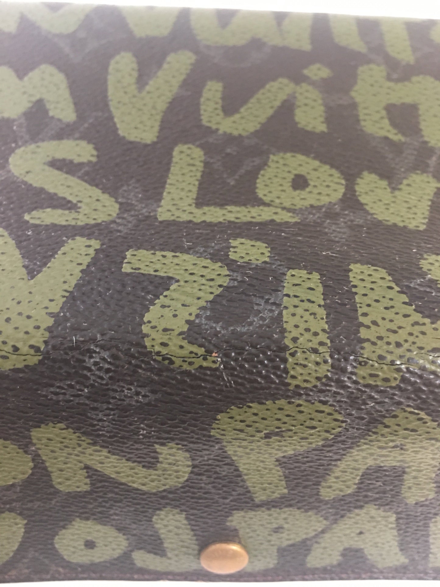 LOUIS VUITTON Limited Edition x Stephen Sprouse Graffiti Wallet in brown canvas