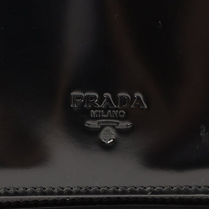 Prada Patent Logo Embossed Shoulder Bag Black