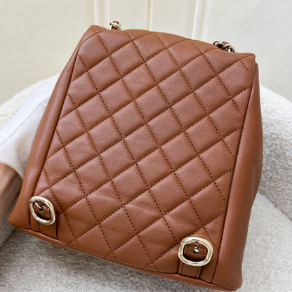 Chanel Medium Triple Backpack in 23A Cognac Brown Calfskin and LGHW (Model: AS3860)