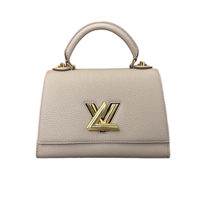 Louis-Vuitton Twist One Handle PM Taurillon Greige GHW