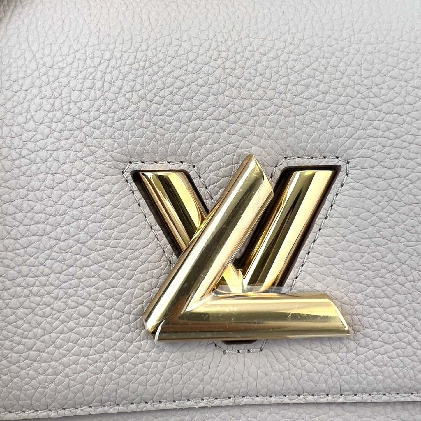 Louis-Vuitton Twist One Handle PM Taurillon Greige GHW