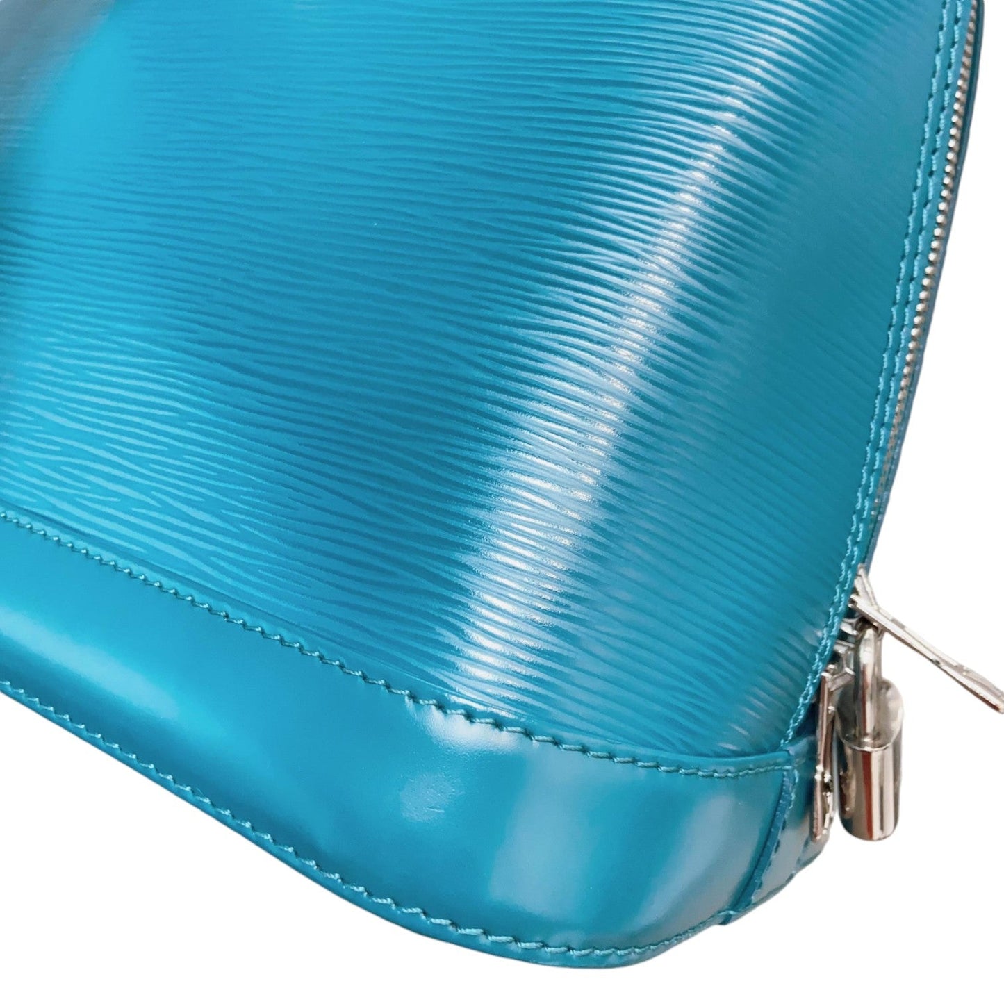 Louis-Vuitton Alma PM Epi Leather Blue SHW