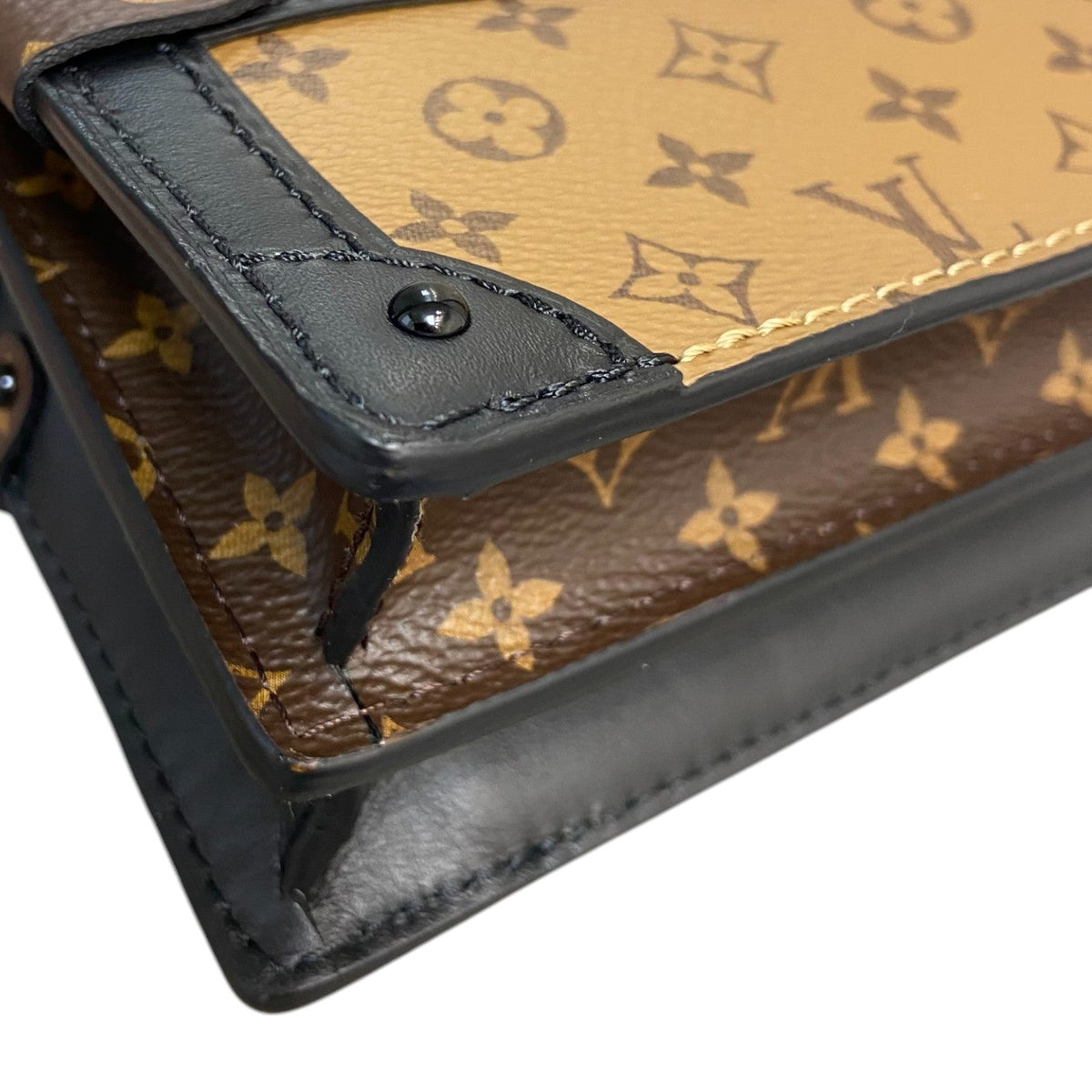 Louis-Vuitton Trunk Clutch Reverse Monogram Brown Black GHW