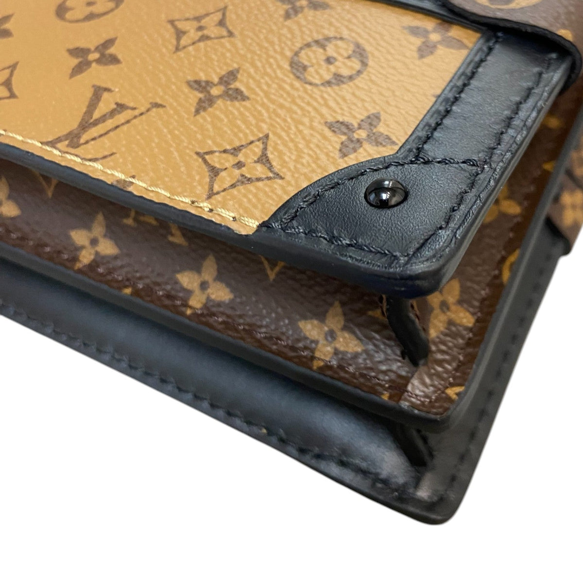 Louis-Vuitton Trunk Clutch Reverse Monogram Brown Black GHW
