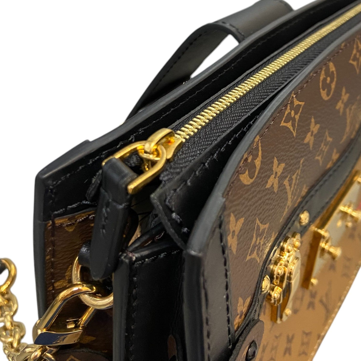 Louis-Vuitton Trunk Clutch Reverse Monogram Brown Black GHW