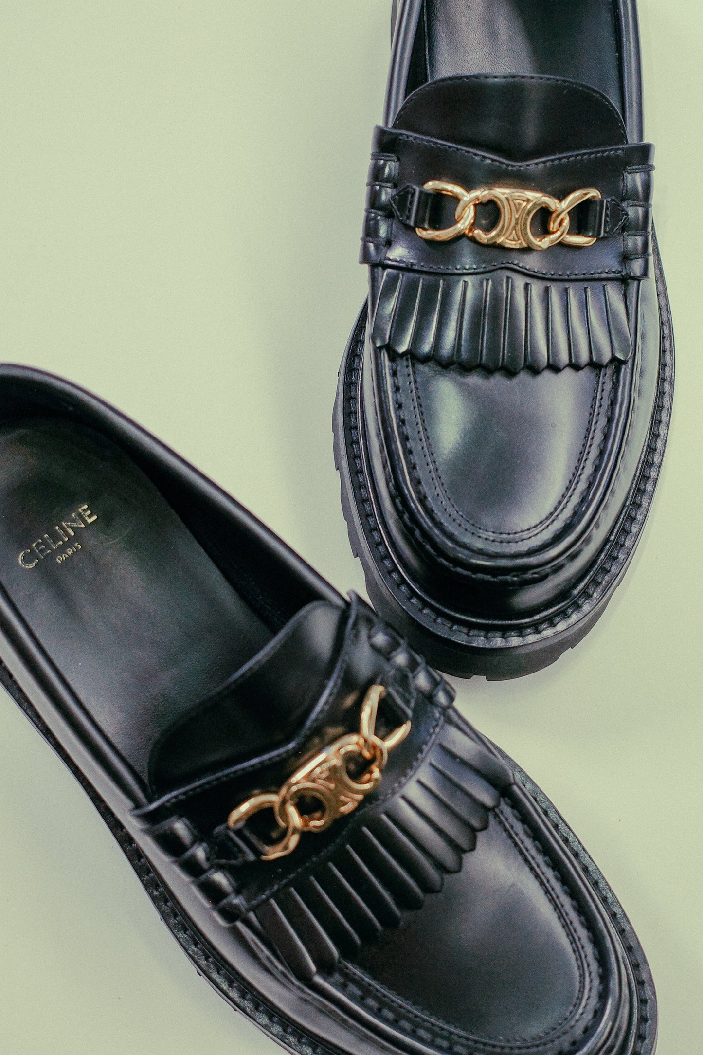 CELINE Margaret Fringed Triomph Loafers Black