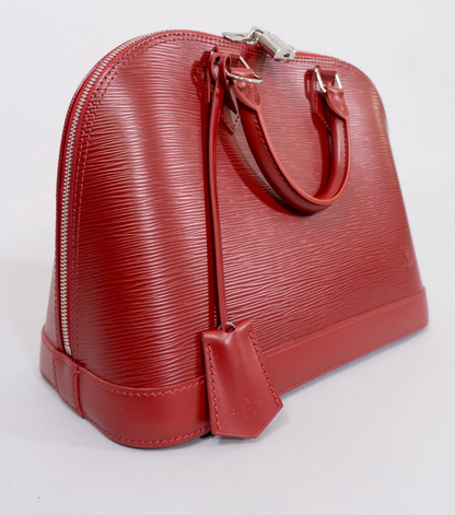 LOUIS VUITTON EPI ALMA NM HANDBAG