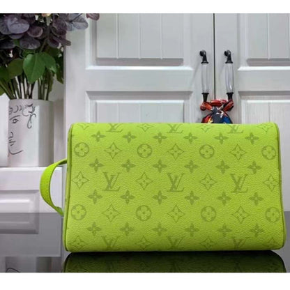 Louis Vuitton LV Unisex Dopp Kit Neon Yellow Monogram Coated Canvas Taiga Cowhide Leather
