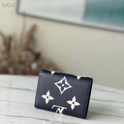 Louis Vuitton LV Unisex Victorine Wallet Black Monogram Empreinte Embossed Supple Grained Cowhide