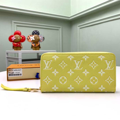 Louis Vuitton LV Unisex Zippy Wallet Yellow Monogram Empreinte Embossed Supple Grained Cowhide