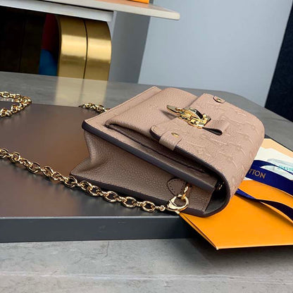 Louis Vuitton LV Women Vavin Chain Wallet Tourterelle Gray Embossed Cowhide Leather
