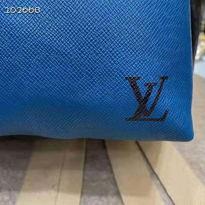 Louis Vuitton Unisex Discovery “V” Logo Backpack Blue Monochrome Taiga Leather