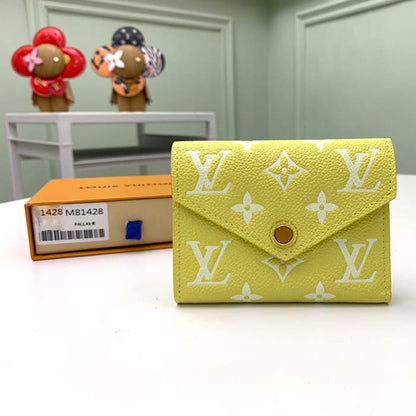 Louis Vuitton Unisex Victorine Wallet Lemon Yellow Monogram Empreinte Embossed Supple Grained Cowhide