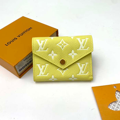 Louis Vuitton Unisex Victorine Wallet Lemon Yellow Monogram Empreinte Embossed Supple Grained Cowhide