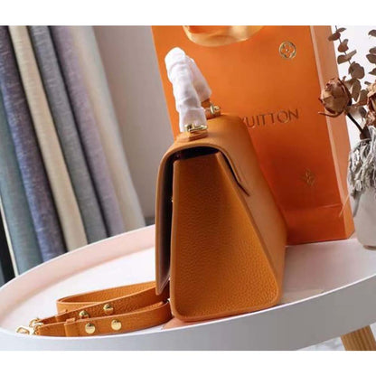 Louis Vuitton Women Twist One Handle PM Handbag in Taurillon Leather-Brown