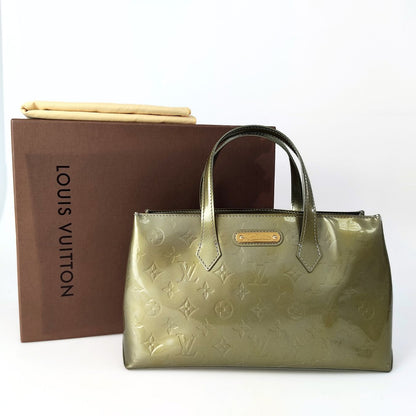 LOUIS VUITTON Wilshire patent leather handbag