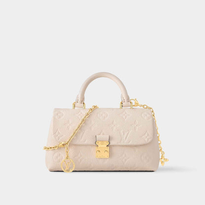 Louis Vuitton Nano Madeleine Handbag Monogram Empreinte Leather Cream Model View 