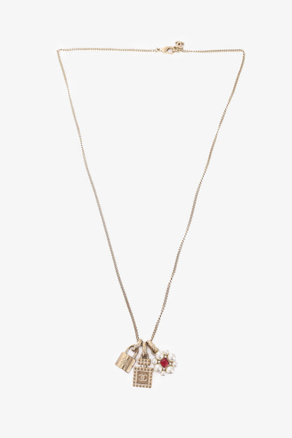 Chanel™ CC Perfume Bottle Padlock Flower Triple Pendant Necklace