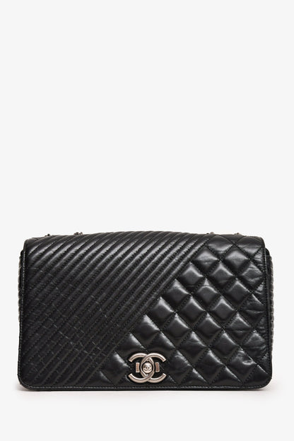 Pre-Loved Chanel™ 2014 Black Glazed Leather Coco Boy Flap Bag