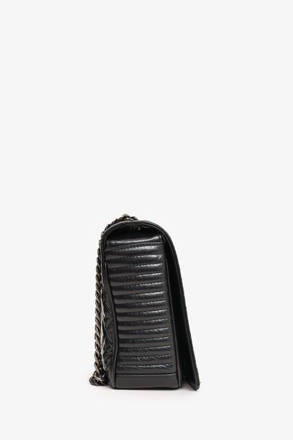 Pre-Loved Chanel™ 2014 Black Glazed Leather Coco Boy Flap Bag