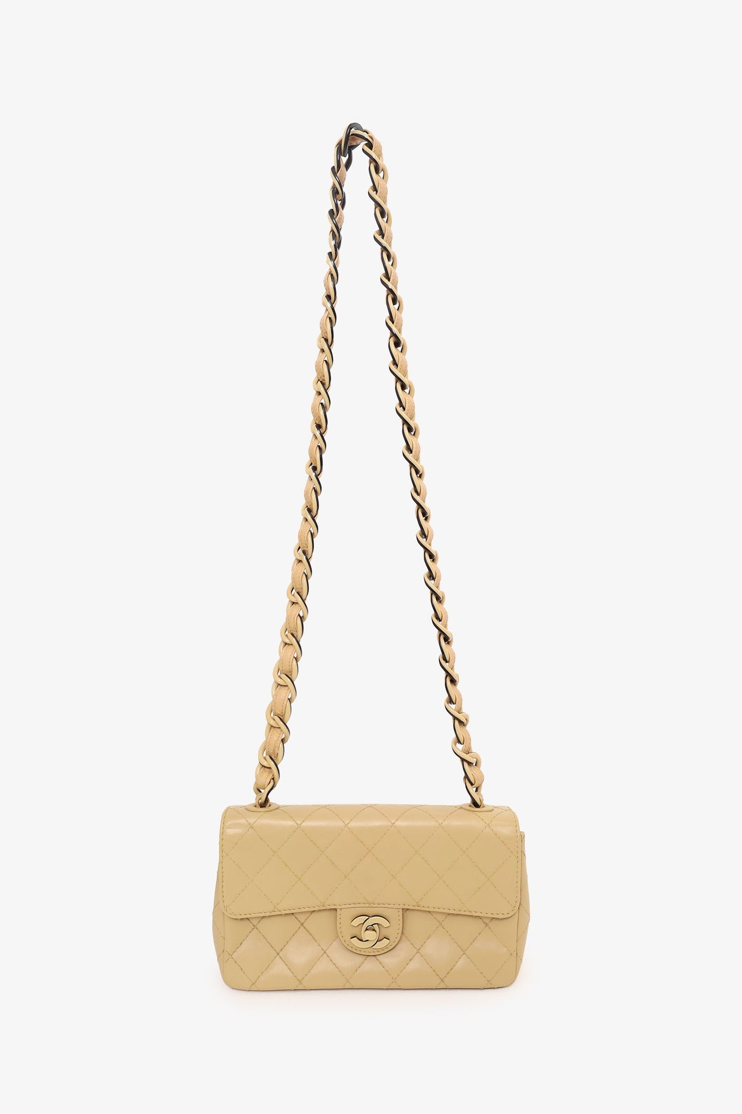 Pre-Loved Chanel™ 2000-2002 Cream Quilted Lambskin Mini Flap Bag