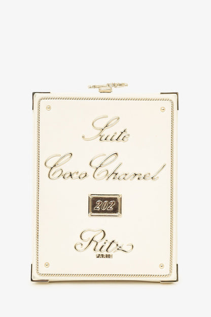Pre-Loved Chanel™ 2017-18 White Lambskin Paris-Cosmopolite Coco In Ritz Clutch with Chain