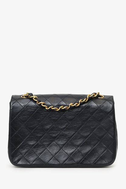 Pre-Loved Chanel™ 1986-88 Black Quilted Lambskin Circle CC Mini Flap Bag