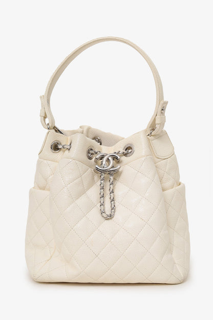 Pre-Loved Chanel™ 2019-20 Cream Caviar Leather CC Chain Drawstring Bucket Bag