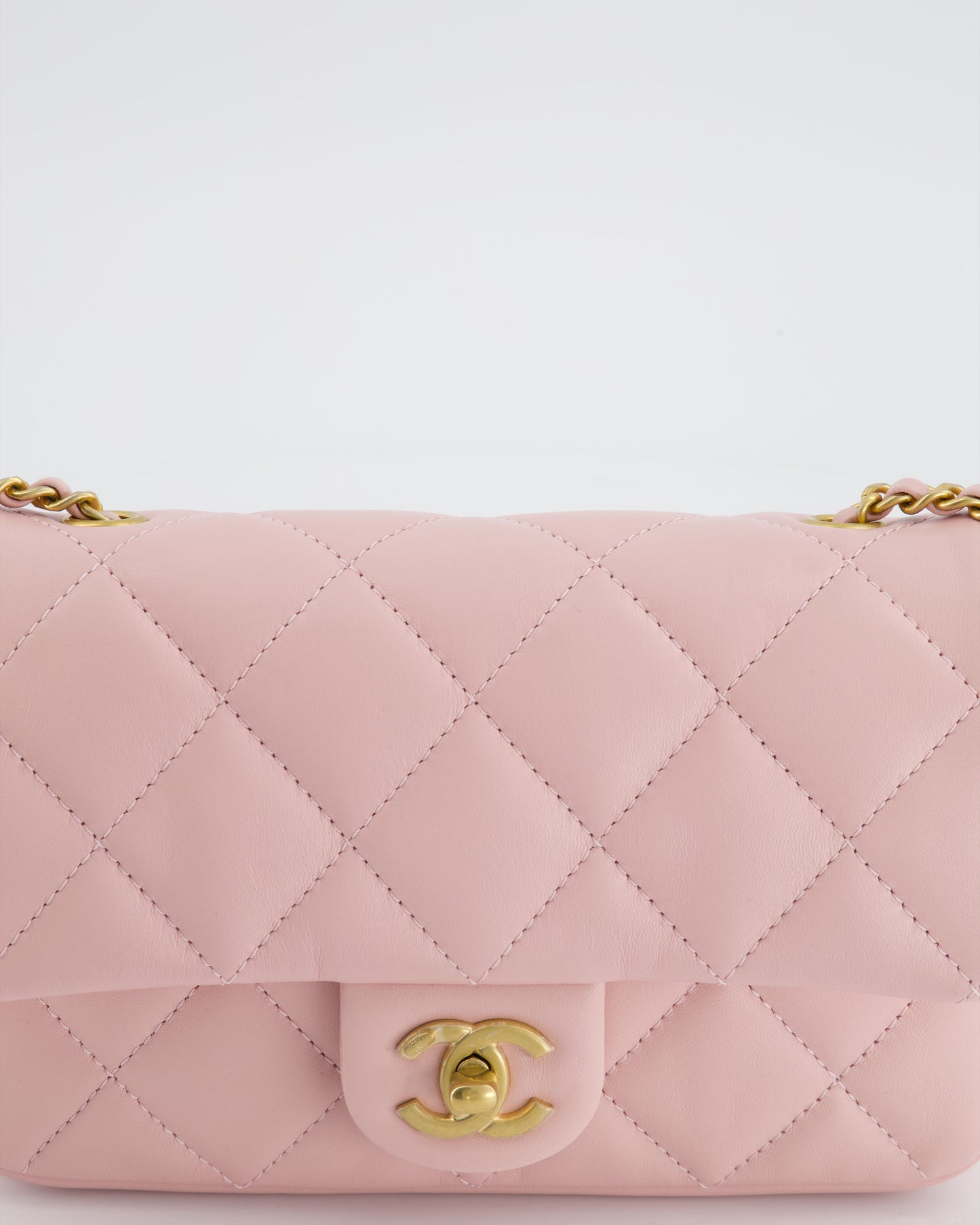 Chanel Pink 22B Mini Flap Bag in Lambskin Leather with Gold Hardware and Hearts Chain Detail