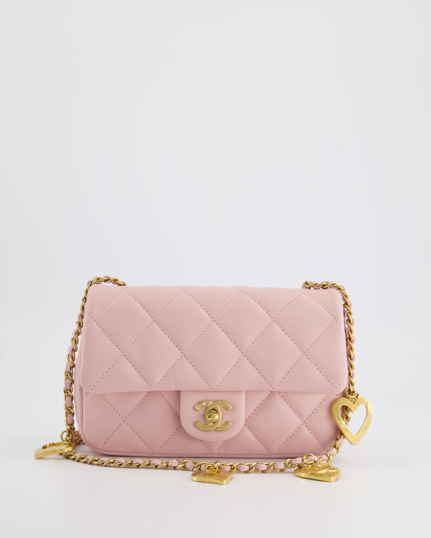 Chanel Pink 22B Mini Flap Bag in Lambskin Leather with Gold Hardware and Hearts Chain Detail