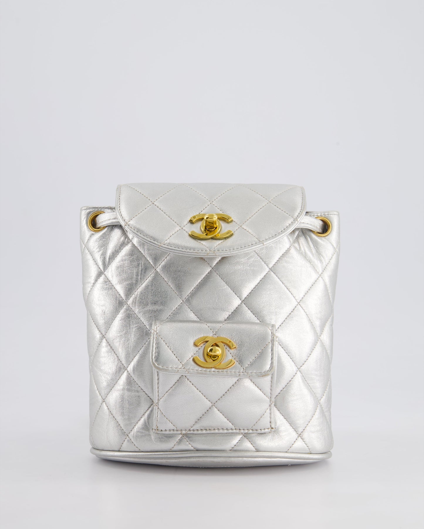 *RARE* Chanel Metallic Silver Vintage Mini Duma Backpack Bag in Lambskin Leather with 24K Gold Hardware