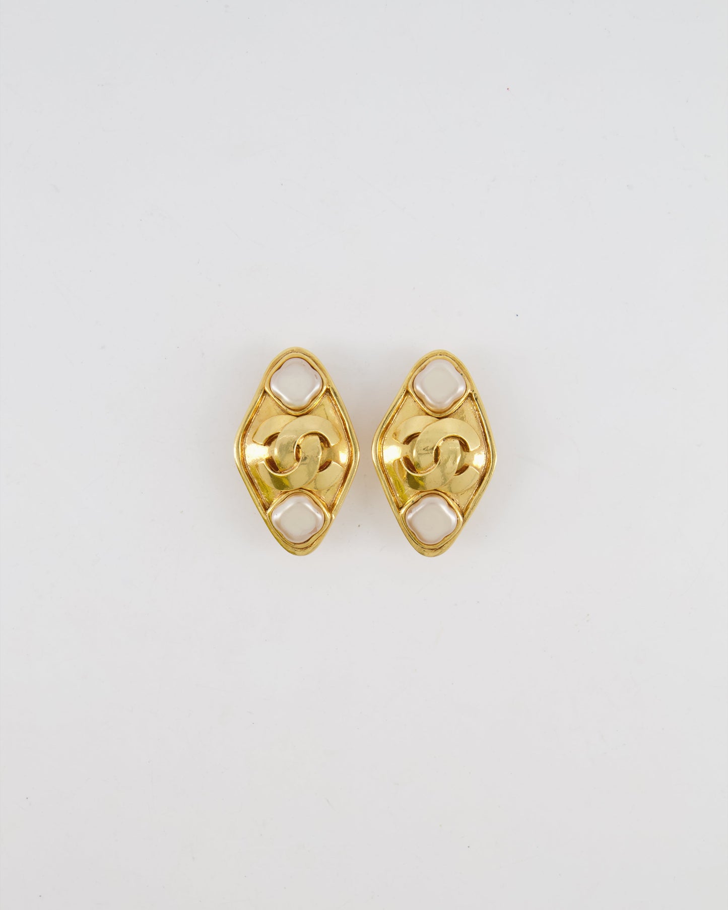 Chanel Vintage 95P Gold Rhombus Shaped Clip on Earrings with Mother of Pearl and CC Logo