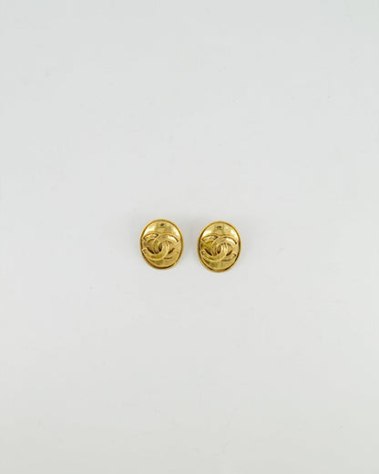 Chanel Vintage 94P Gold Polished Oval Clip On Earrings with CC Logo